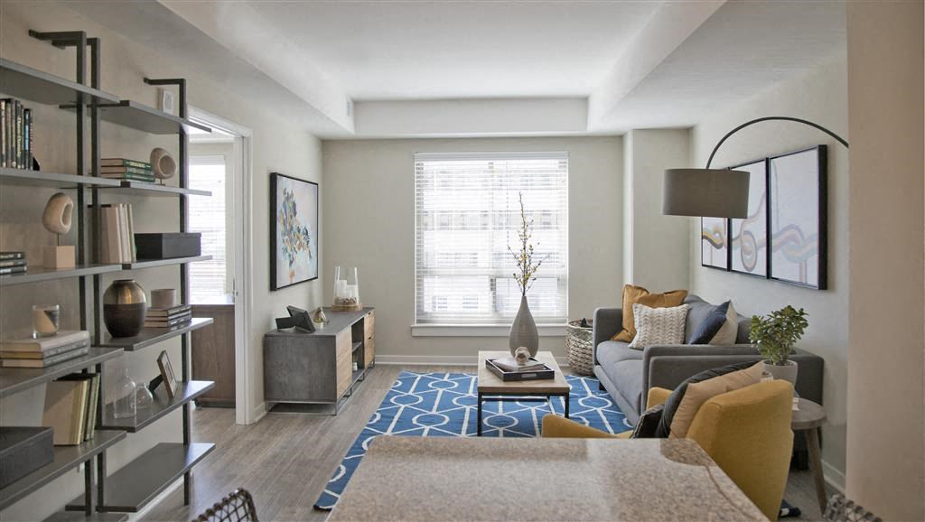 a living room with a couch and a table