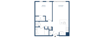 A floor plan of a house with a bedroom, living/dining area, and kitchen.