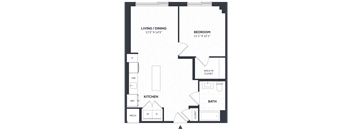 A floor plan of an apartment with a balcony, bedroom, living/dining area, kitchen, bath, and walk-in closet.