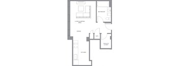 A floor plan of a small apartment with a living-sleeping area, dining area, kitchen, bathroom, and walk-in closet.