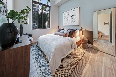 bedroom with bed and two side tables