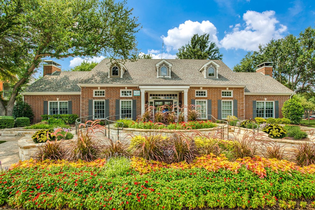 Welcome home! Our charming front office sets the tone with classic architecture and beautifully manicured landscaping.
