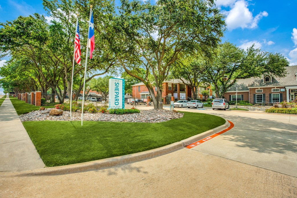 Our tree-lined entrance welcomes you to Old Shepard Place with charm, curb appeal, and a true sense of home.