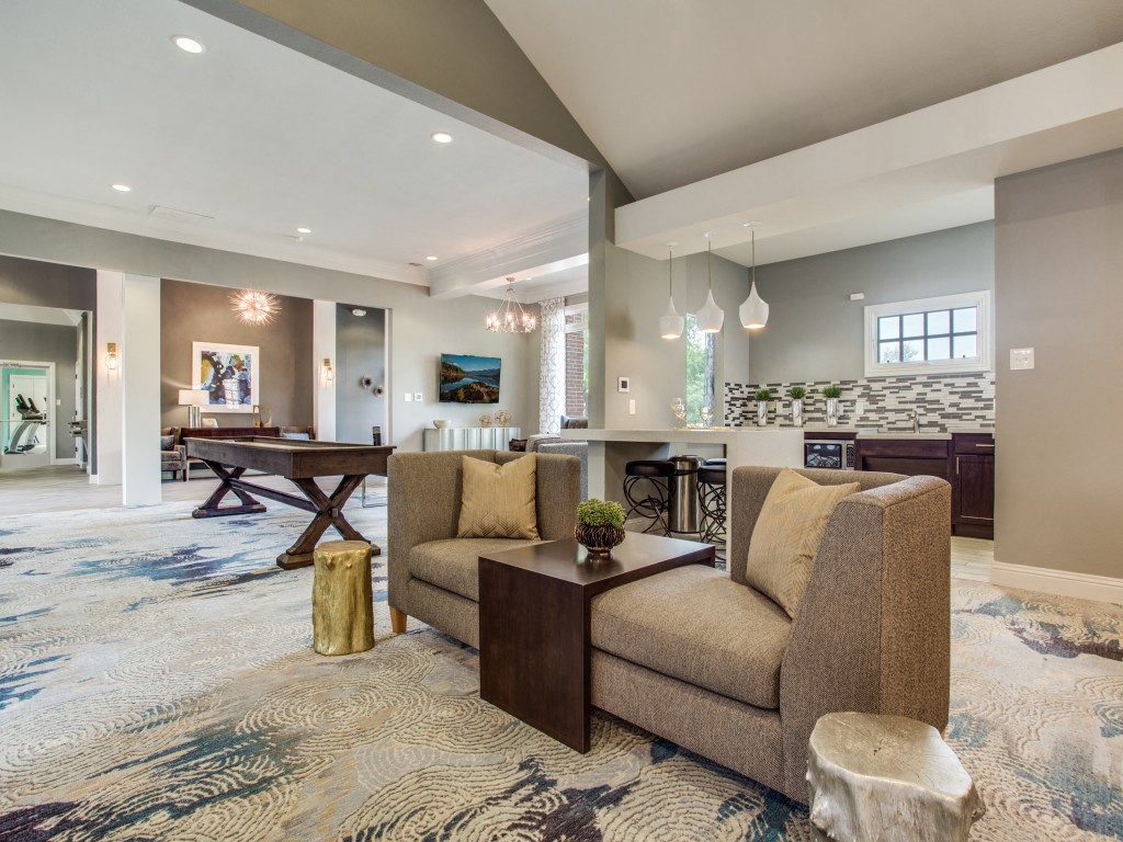 a living room with a couch and a table