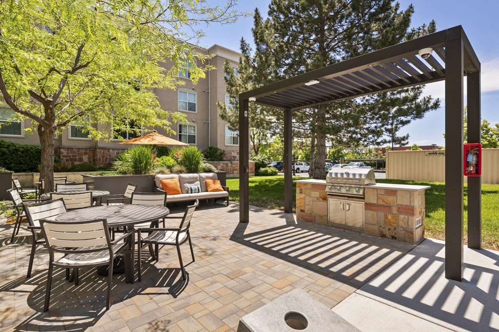 the reserve at bucklin hill patio with grill and seating area