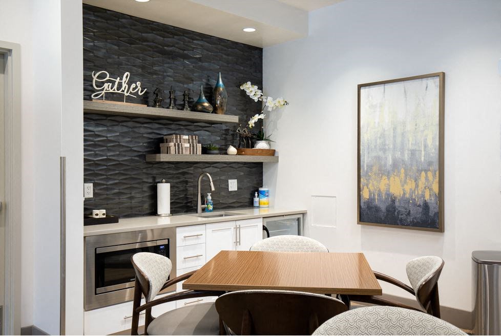 Mini kitchen area with seating