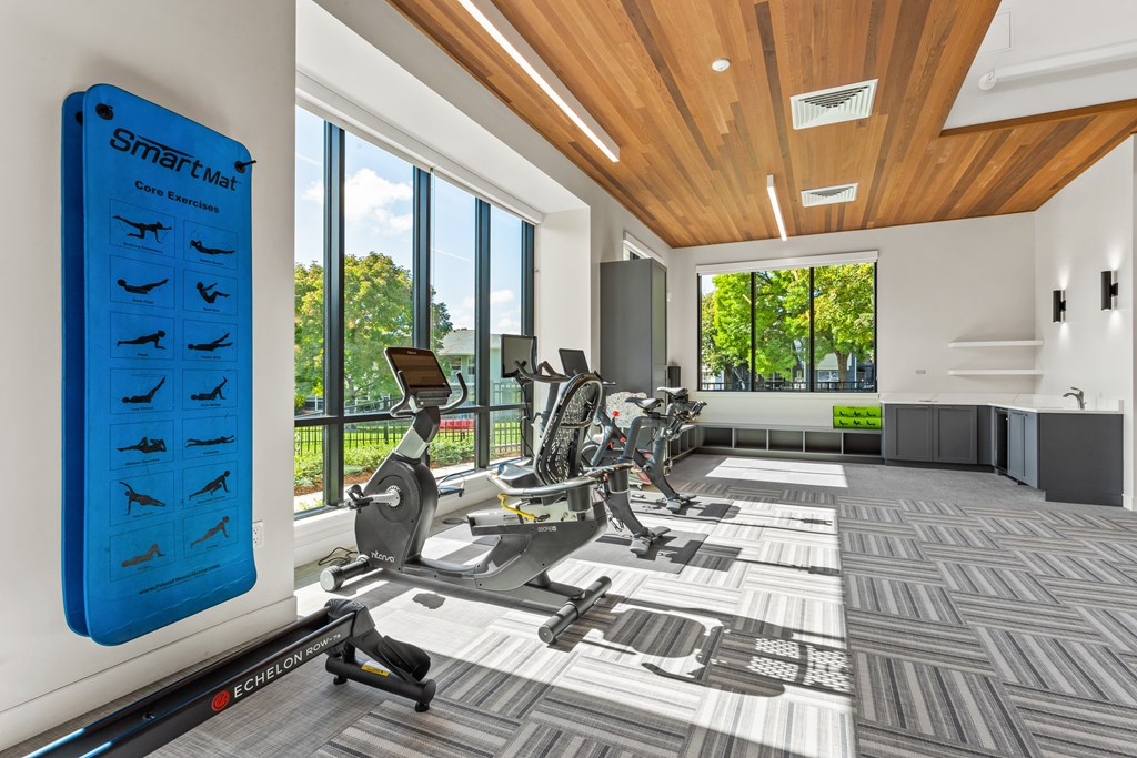 A gym with a blue poster on the wall.