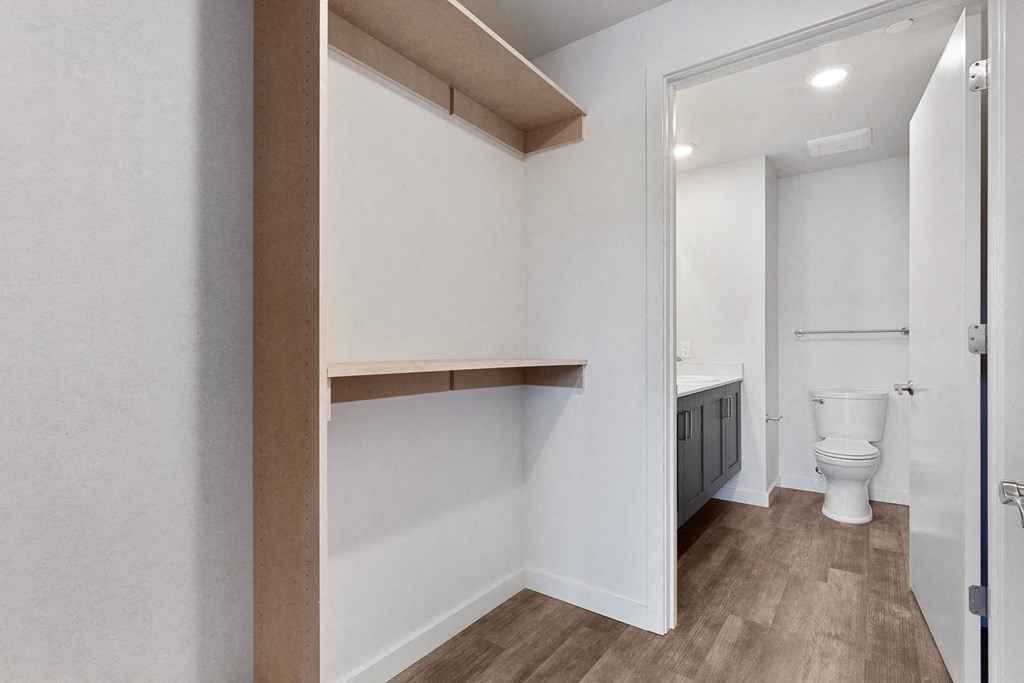 a bathroom with a sink and a toilet in a house