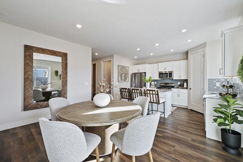 Dining room and kitchen area furnished