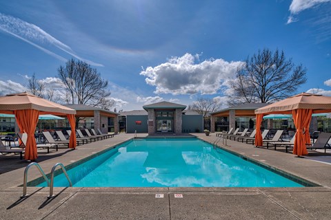 Lake Oswego, OR, Apartments - Kruseway Commons - Swimming Pool with Sun Deck, Shade Areas with Lounge Chairs, and Access to the Clubhouse.