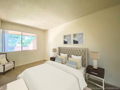 Bedroom With Expansive Windows at Carrington Apartments, California