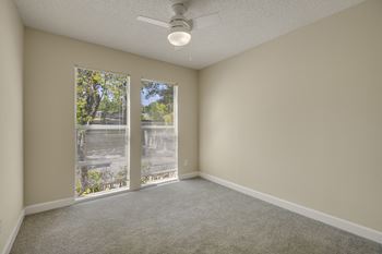 Cozy Bedroom with Plush Carpeting at 3543 Brook Street Apartments in Lafayette