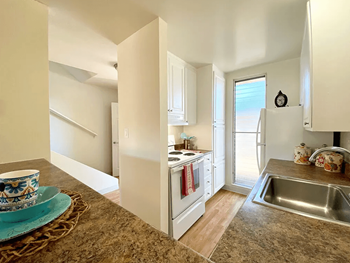 Efficient Appliances in Kitchen with Hardwood Flooring at Diablo Pointe in Walnut Creek, 94596