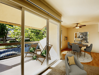 Gorgeous Private Balcony with Lounge Chairs and Large Sliding Glass Doors at Carriage House in Fremont, California