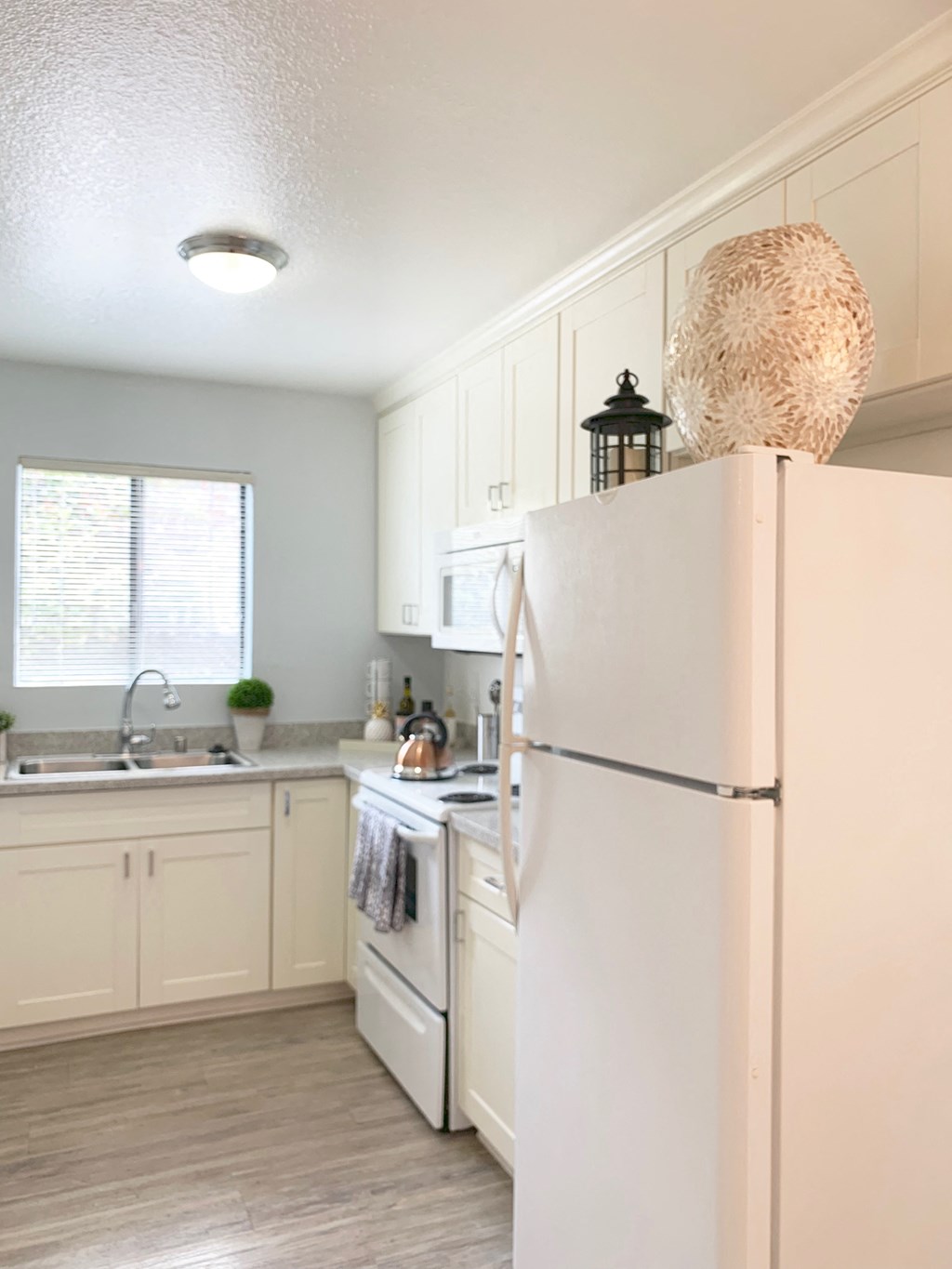Kitchen with fridge at Park Avenue Apartments, San Jose, CA, 95126