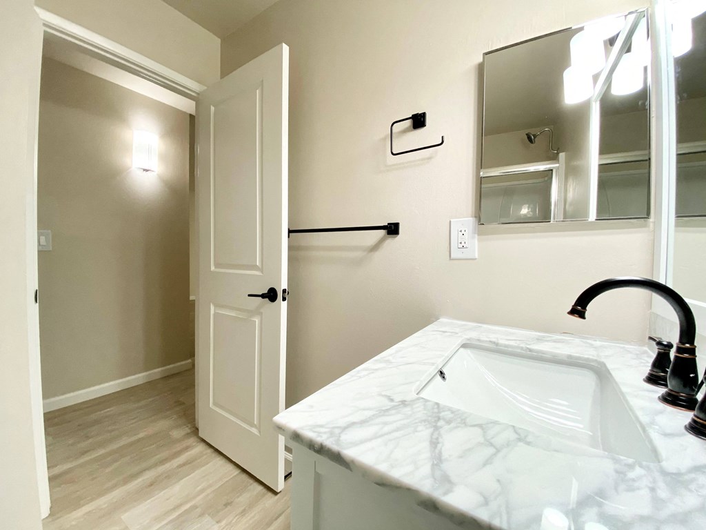 Renovated Bathrooms With Quartz Counters at The Morgan, California