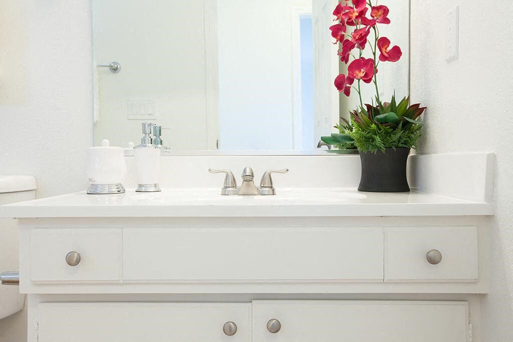 Renovated Bathrooms With Quartz Counters at The Monterey, California