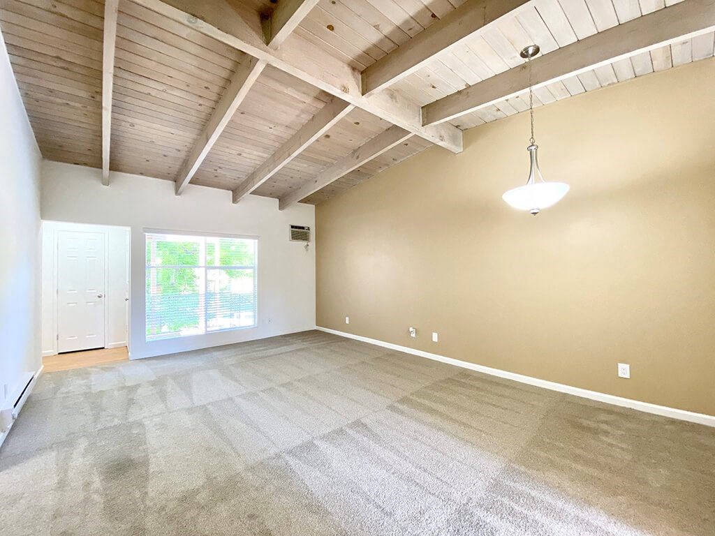Living Room With Expansive Window at The Glens, California