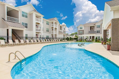 A large swimming pool in front of apartment buildings at Concord Ridge Apartments, Concord, NC