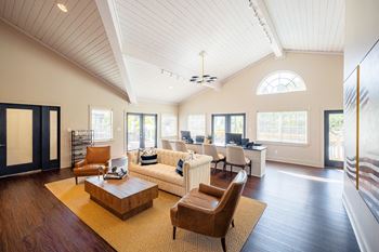 a living room with a couch and chairs and a table at Inverness Cliffs, Birmingham, 35242
