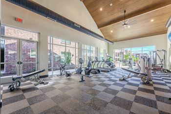 A gym with a variety of exercise equipment. at Magnolia Grove Apartments, Terrell, 75160