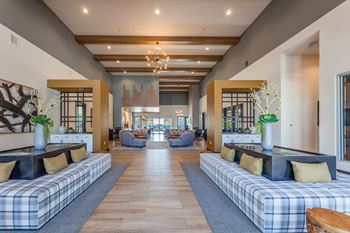 A long hallway with a bench on each side. at Magnolia Grove Apartments, Terrell, TX, 75160