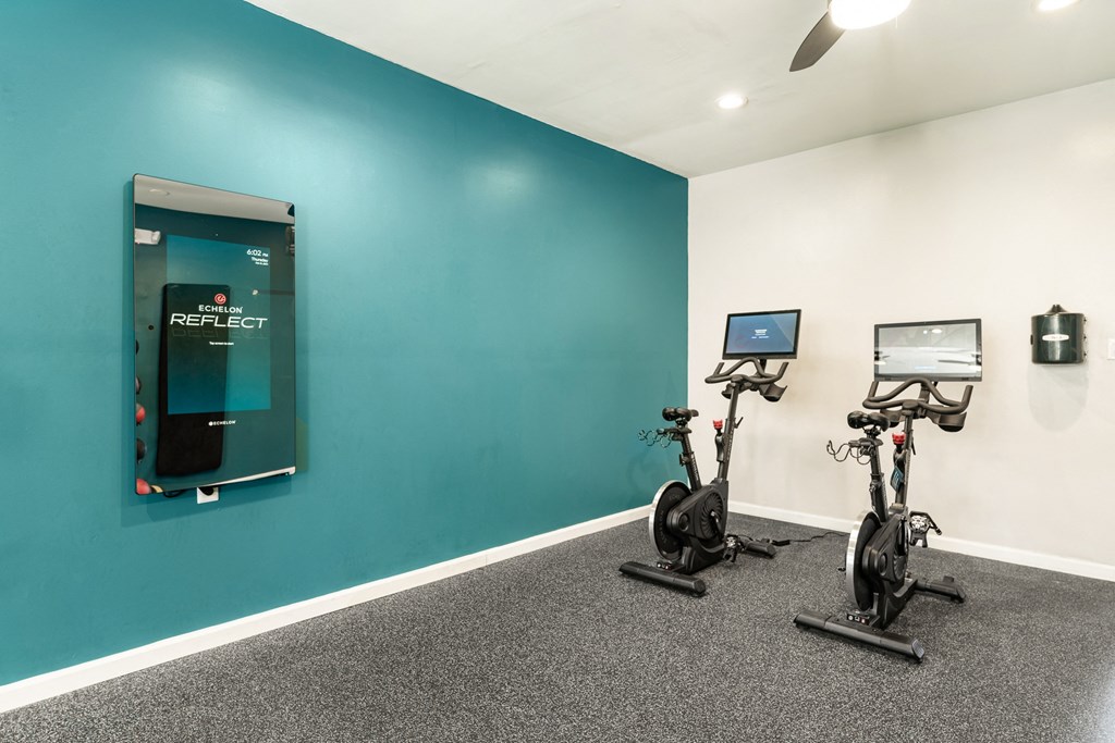 two exercise bikes at WildForest Apartments, Birmingham, AL