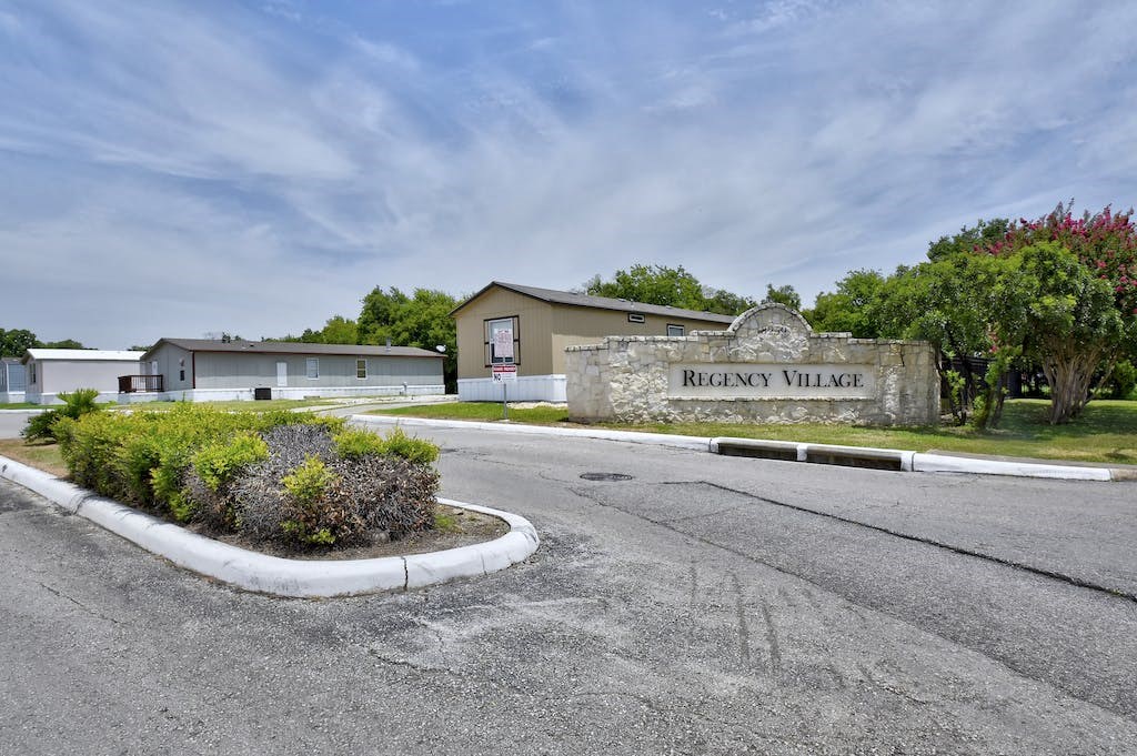 a building with a sign that says raleigh villa