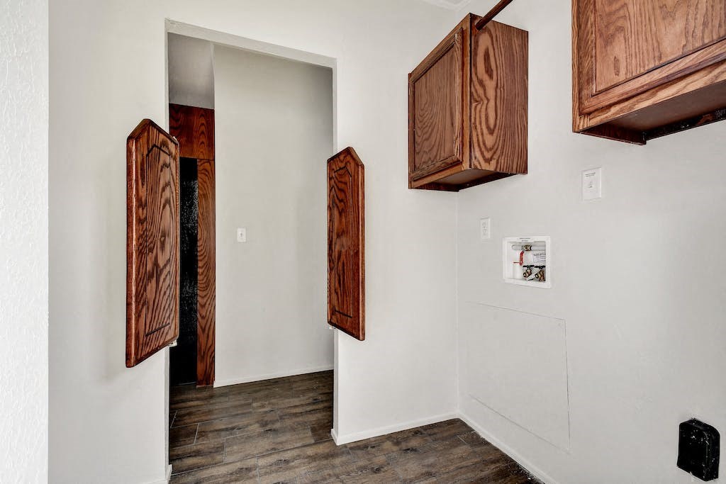 Beautiful wood cabinets and canteen doors at Forest Vista, La Porte, Texas