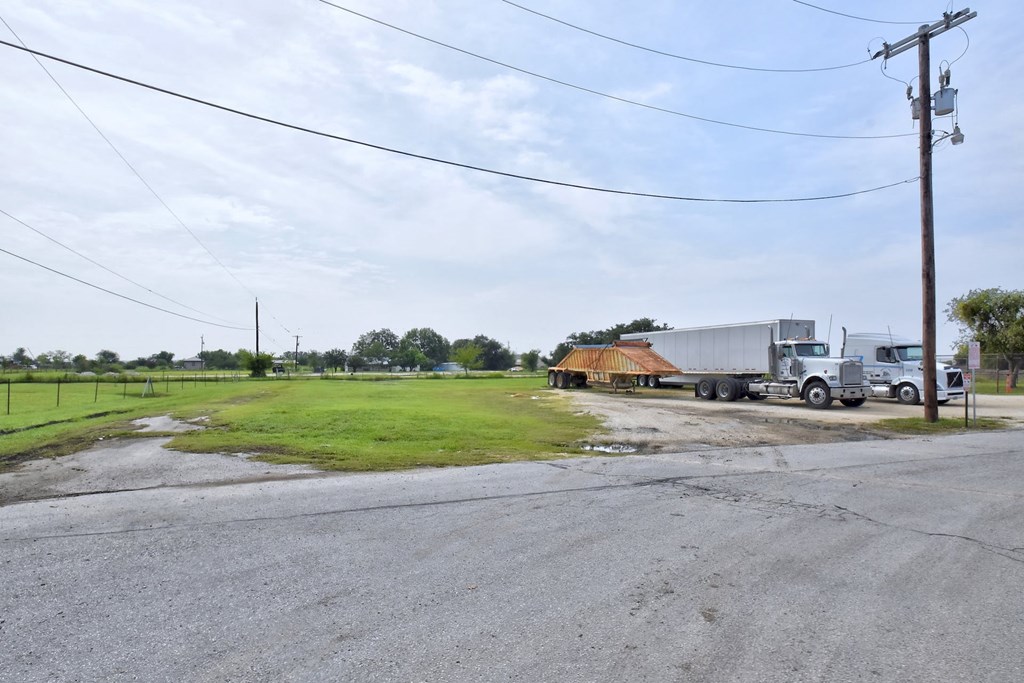 a large truck parked on the side of a road