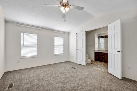 Room with a Ceiling Fan at Buckingham Village Apartments, Universal City, 78148