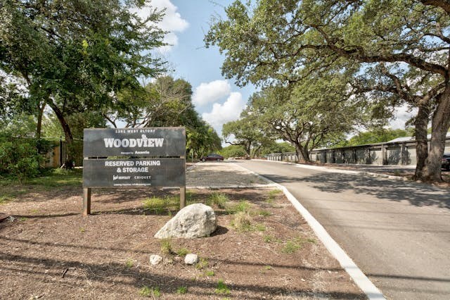 a sign sitting on the side of a road