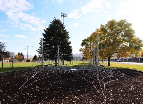 Large spider web sculpture at Pioneer Park Apartments, Green River, 82935