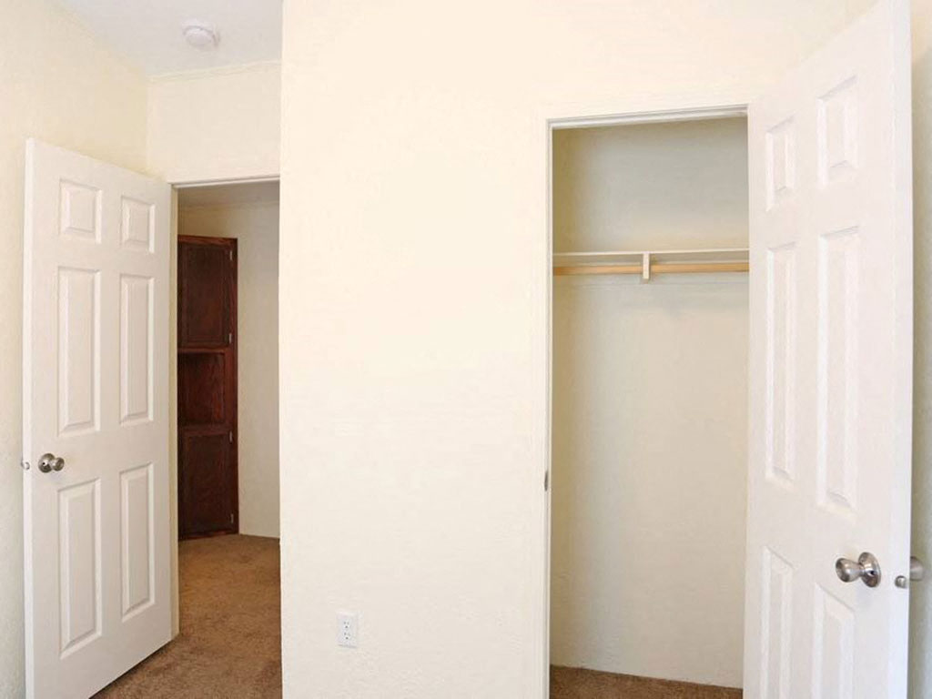 Bedroom With Hallway Closet at Maple Grove Rental Home Community in Lincoln, NE