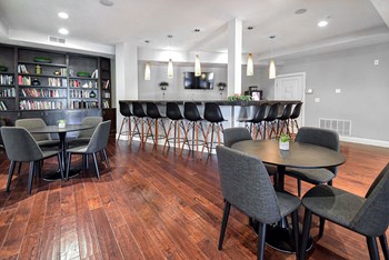 Clubhouse Kitchen Breakfast Bar with Stools Clubhouse Kitchen Breakfast Bar with Stools at Kenyon Square Apartments, Westerville, 43082 - Photo Gallery 4