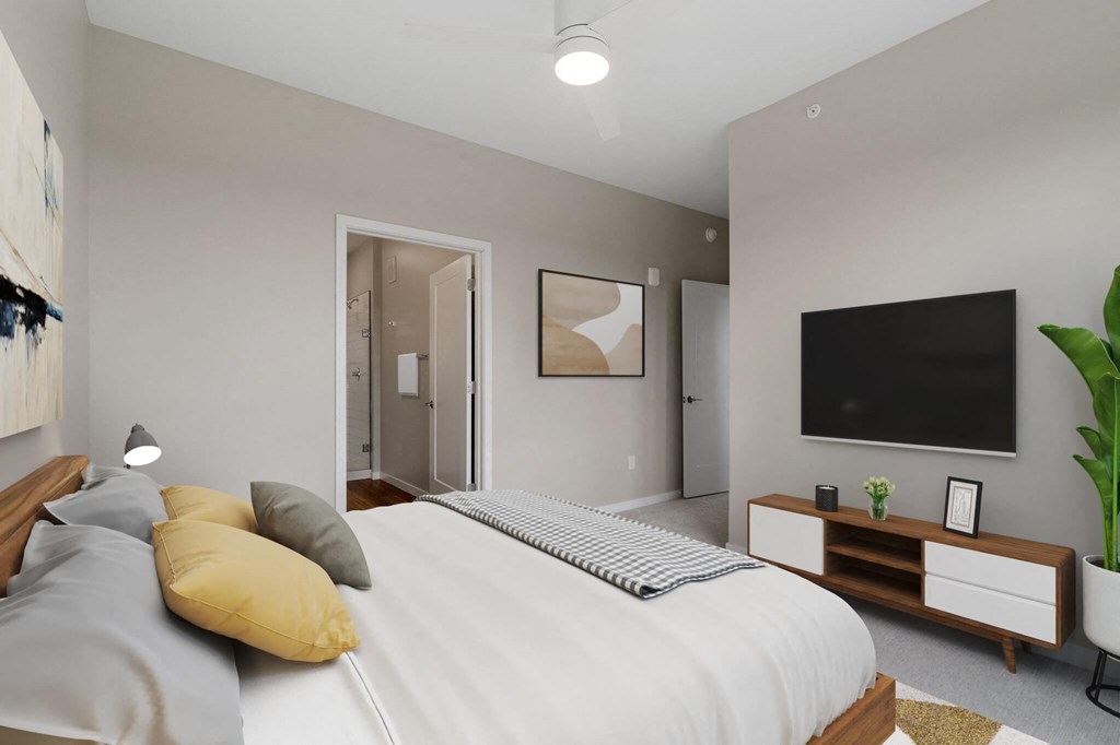 apartment bedroom with walk-in closet and en suite bathroom at The Hallon Apartments, Hopkins, Minnesota