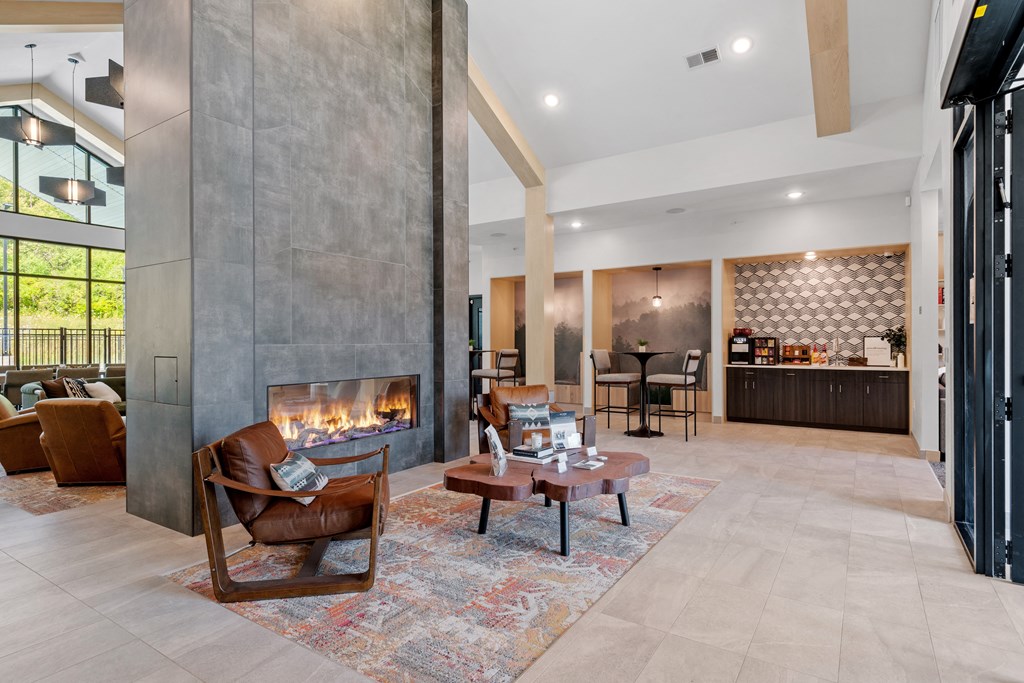 Clubhouse living room with fireplace at The Lodge at Overland, Rochester, MN, 55901