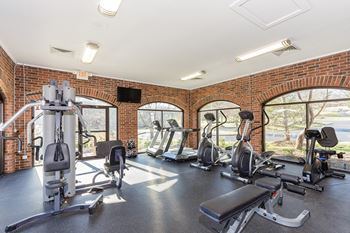 Modern Fitness Center at Reflection Cove Apartments in Manchester, MO