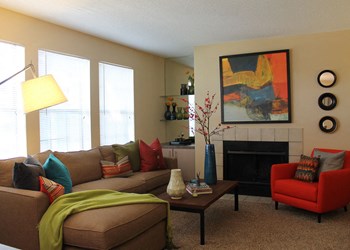 Open living room with huge windows Open living room with huge windows at Park Laureate in Jeffersontown, Louisville, KY 40220 - Photo Gallery 2