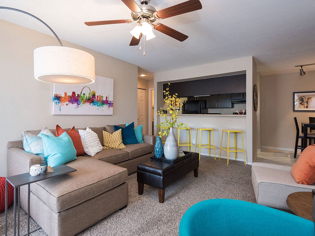 Living rom with kitchen view at Reflection Cove Apartments in Manchester