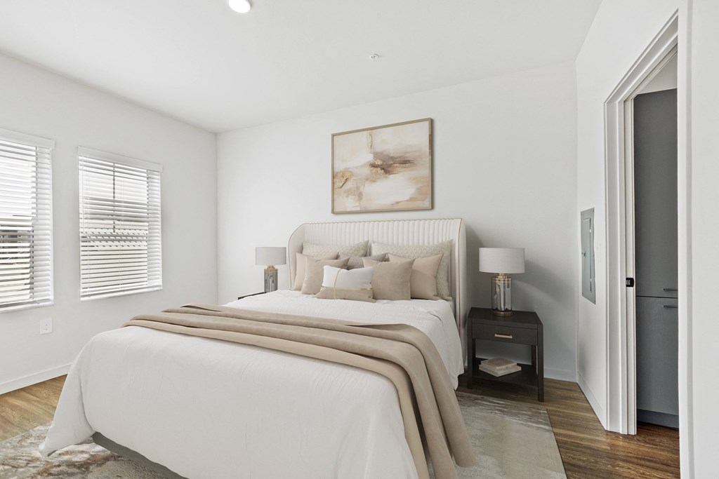 Cozy Bedroom with White Walls at Azalea Luxury Apartments, Tampa, Florida