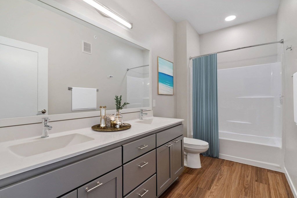 modern bathroom with soaking tub at The Hallon Apartments, Hopkins MN, 55343