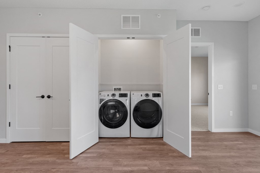 our apartments offer a laundry room with a washer and dryer at The Lodge at Overland, Rochester, Minnesota