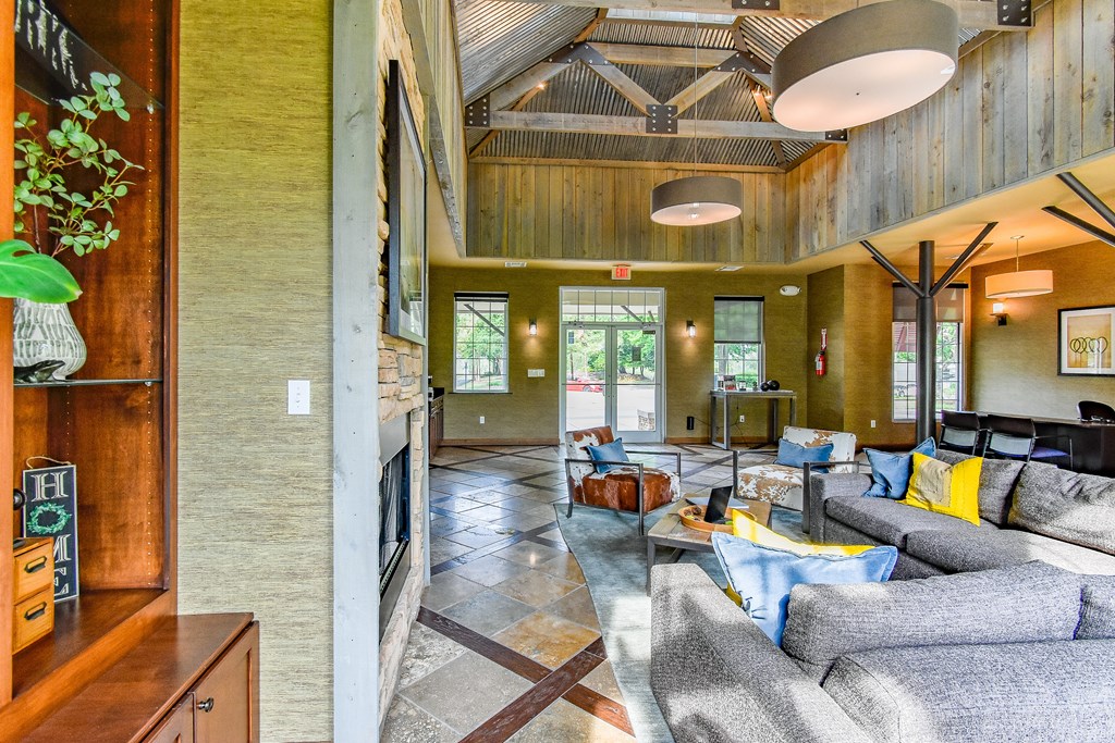 a living room filled with furniture and a fire place at Riverset Apartments in Mud Island, Memphis, TN
