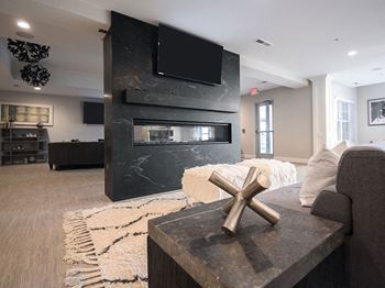 Living room decor with big tv at Mirada Apartments, Ohio