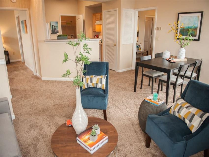 Living room/dining area at Waterford Place Apartments, Memphis, TN - Photo Gallery 1