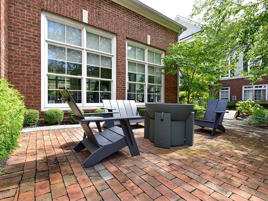 Outdoor lounge area with fire pit at Central Park Apartments in Worthington, Columbus, OH