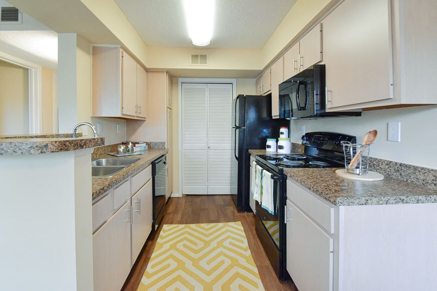 this is a photo of the kitchen in a 1 bedroom apartment at deer hill apartments in c