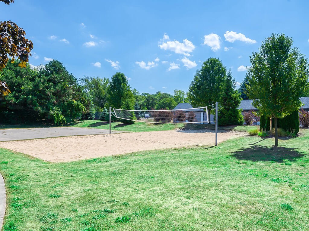Outdoor sand volleyball court at Waterchase Apartments, Wyoming, Michigan