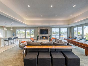Clubroom With Smart Tv And Fireplace at Waterchase Apartments, Michigan